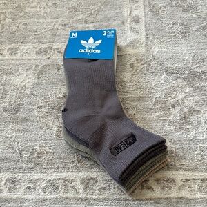 Adidas 3 Pair High Quarter socks. Size Medium, fits shoe sizes 7-8.5. NWT’s.